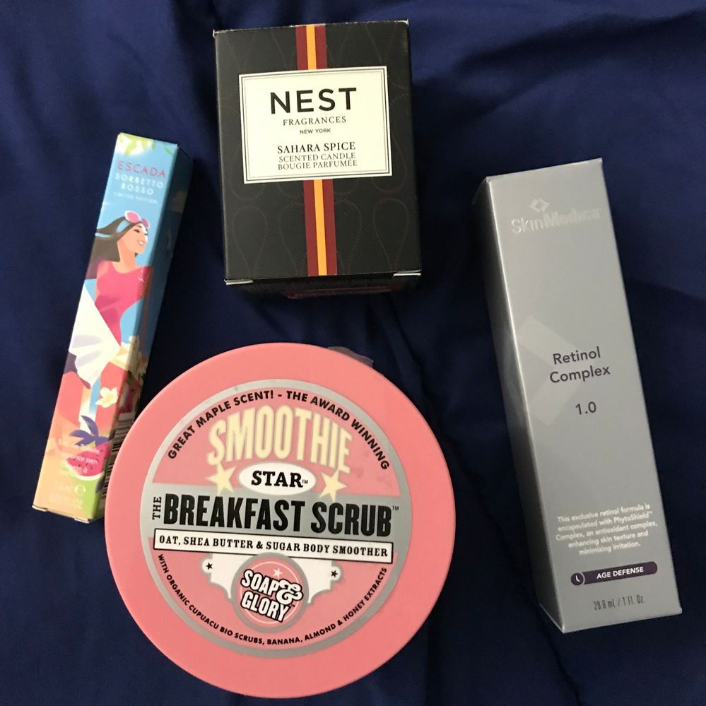 The scrub and perfume are from Ulta's Platinum Appreciation, the Skinmedica from Dermstore, and I got the Nest candle at Nordstrom Rack for  $5
