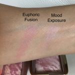 Euphoric is much more shimmery and darker than Mood Exposure. It also seems to go on smoother.