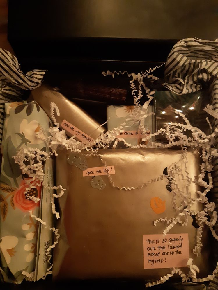 This wrapping paper is SO PRETTY, I almost didn't want to open them so they could sit under my tree =)