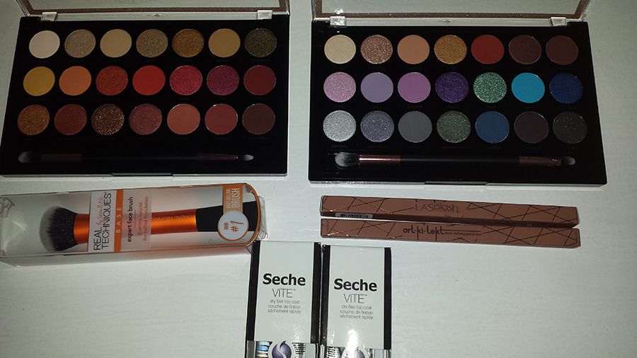 The eyeshadows and brush are from Target. The eyebrow pencil is from LA Splash, the Seche Vite is from CVS.