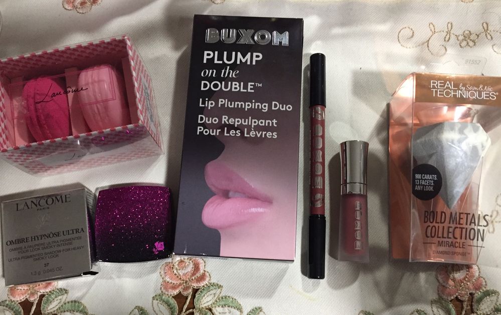 Lancôme macaron blush and blender: $19.99, Lancôme ombre hypnose ultra eyeshadow for $12.99, Buxom lip plumping duo which comes with a full sized lip liner and lip cream for $5.99, and a Real Techniques Diamond sponge for $3.99