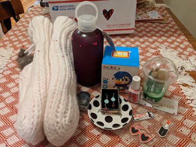 Some very fuzzy socks, a bkr water bottle in my favorite color, a piplup building block set, invisibobbles, a Sephora catch-all bowl, nail polish, stickers, the cutest mini brushes, and some beautiful earrings!