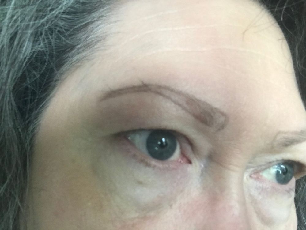 Outlining the shape of my brows with ABH Brow Wiz, using my natural shape (what’s left of it) as a guide.