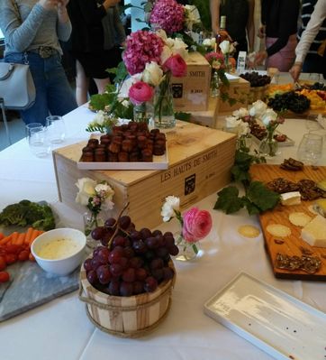 Delicious spread of healthy snacks and wine.