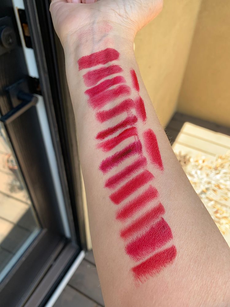 Outdoor lighting- top to bottom then right side top to bottom: BB Red Velvet,TF Stiletto,Shiseido Exotic Red,*Chanel Pirate, Chanel Extreme, Pat M Sedition, Pat M Elson, *Pat M 35mm,*UD Love Drunk, UD Bad Blood,KVD *Hellbent, KVD Hexagram,Bite *Sour Cherry, Bite Tannin. Right side top to bottom: CT Red Carpet Red, LM Rouge Muse, *LM Rouge Profond