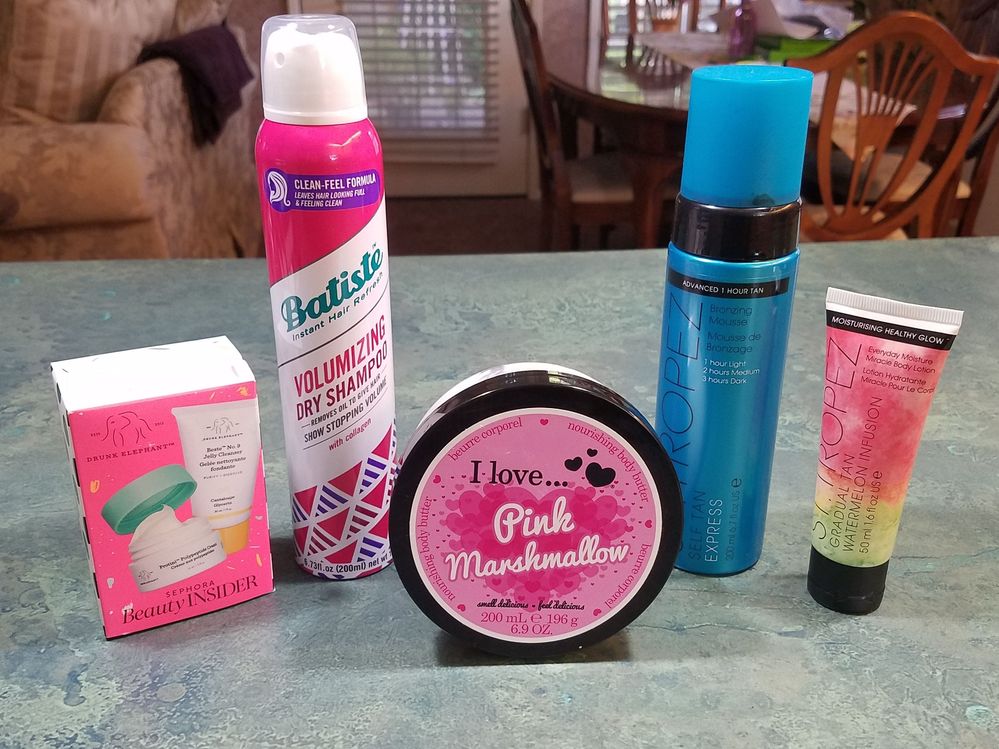 The DE set was my Sephora birthday gift, the Batiste volumizing dry shampoo is something I use mostly as a hair perfume because it smells amazing, the St. Tropez Express Mousse is my absolute favorite self-tanner (without it I'm pathetically pale--so I actually bought a few), and the Pink Marshmallow body butter is such a fun scent.