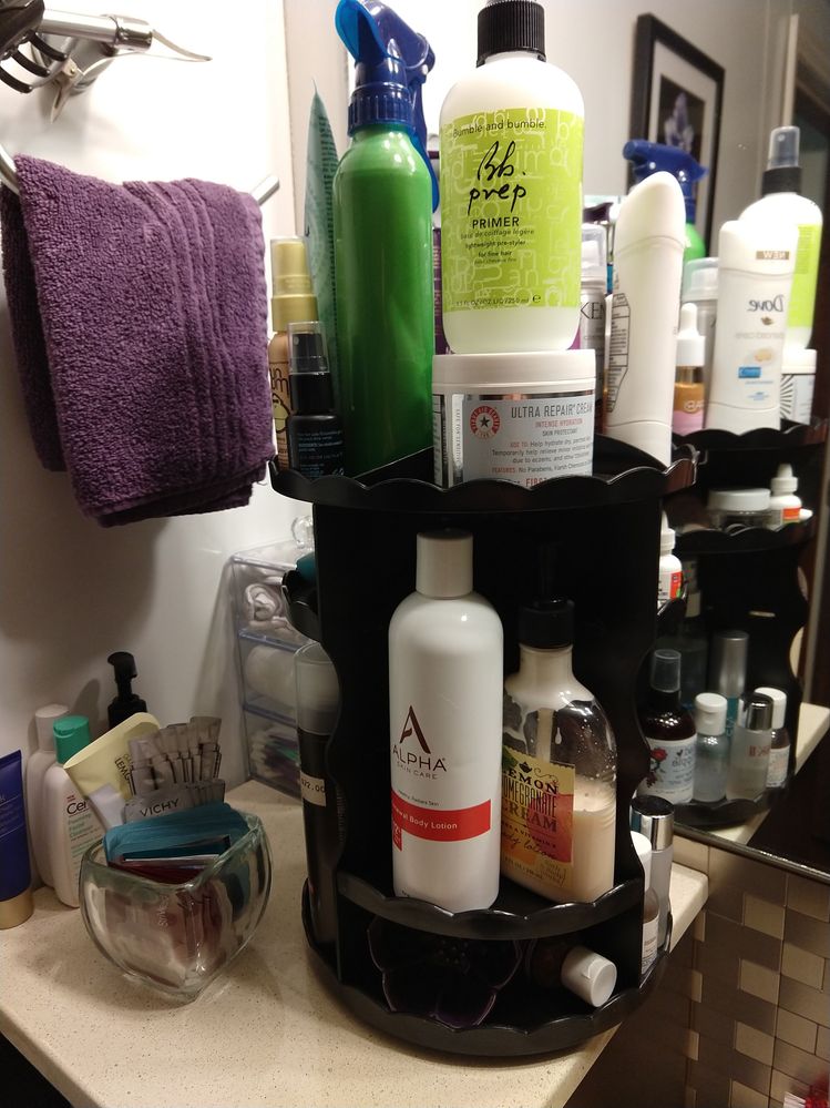 Top: excess hair stuff, Fab cream that I never ever remember to use. Middle: my usual body stuff. Bottom: ds of Dr Bronners liquid soap and a small bowl for quick washings of eyeliner brushes after using a pot liner. The bottom of the bowl has small raised dots which make it super nice and relatively effective for quick jobs like that.