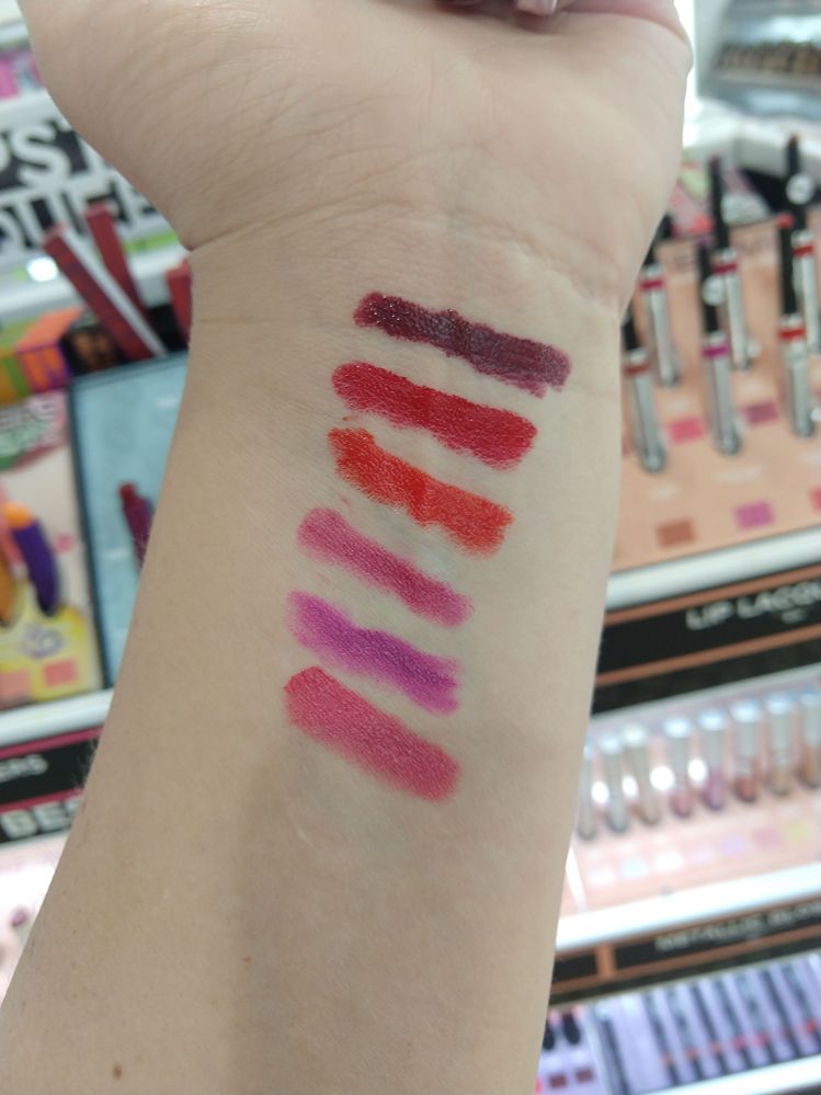 From top to bottom, move from right to left on the display, zigzag (raisin, red, coral and on). Didn't swatch the nudies lol