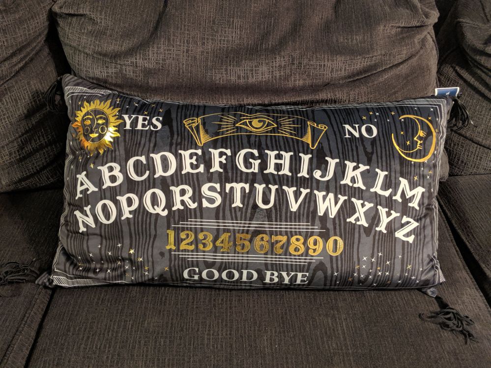 I am in love with the spirit board pillow!