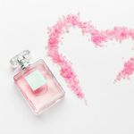 bottle-perfume-with-red-hearts_127657-10725