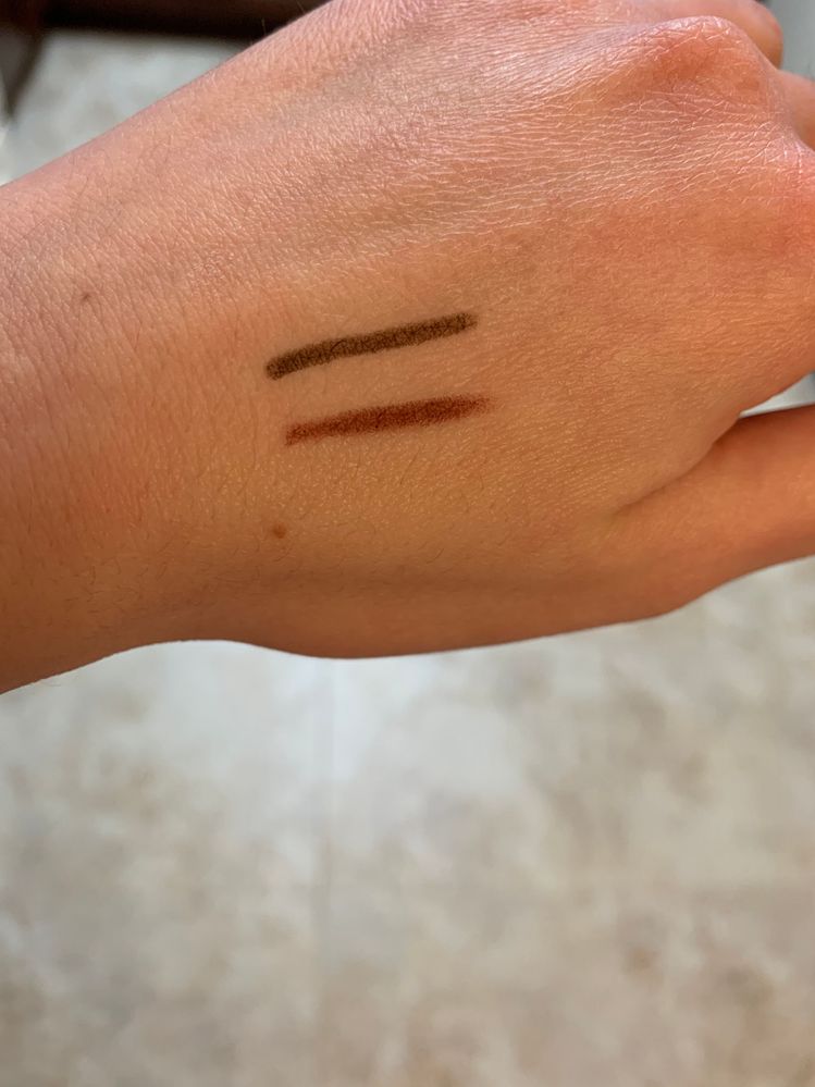 The top is a swatch of Clinique's quickliner in chocolate while the bottom is the CT pillow talk.