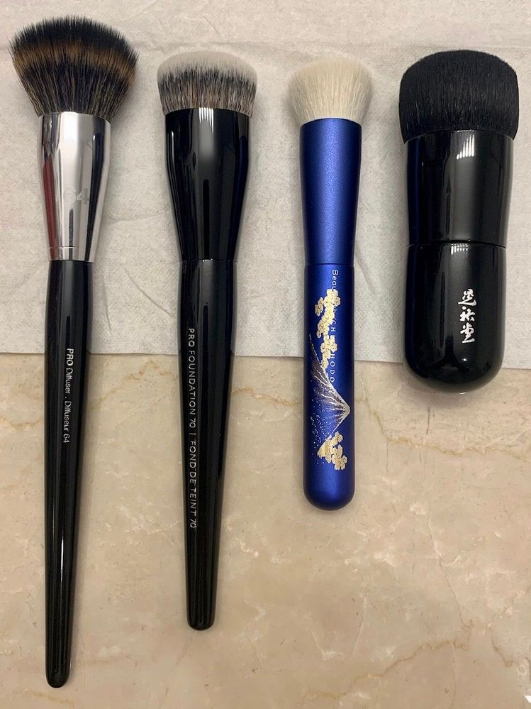 Foundation brushes: 2 Sephora PROS (old vs. new), a Chikuhodo, and a Koyudo.