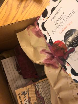 Broken glass bottle with acid - potentially hazardous, putting delivery drivers at risk. Unacceptable.