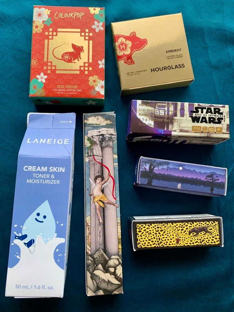 Boxes I’ve kept. The Hourglass Lunar New Year blush doesn’t feature the pig at all (boo hiss), so I’ve considered adding it to the compact lid. The 3 non-PMG lipstick boxes are Lipstick Queen: one of the Cupid’s Bow crayons, Blue By You, and Jungle Queen.