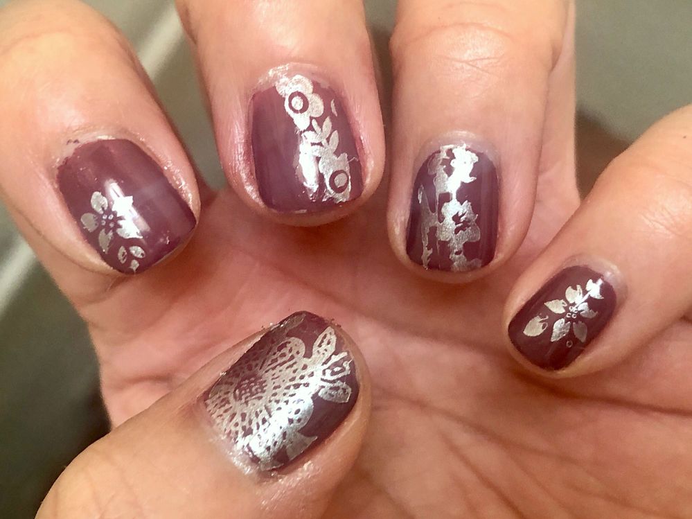 Used a couple of stamping plates. Stamping polish = Revlon Molten Magic