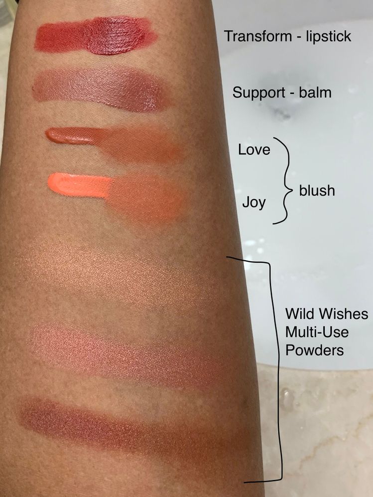 Swatches of Rare Beauty and Sephora Wild Wishes powders.