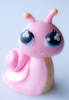 Cute pink snail cake topper.PNG