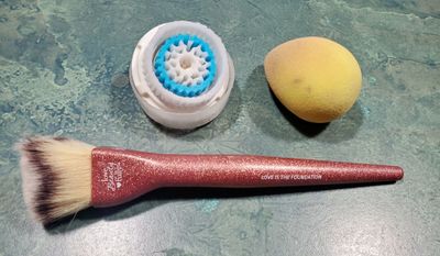 These aren't exactly "Empties" but they're tools that are getting decluttered.  The Clarisonic head and Beautyblender are each about 6 months old so for sanitary reasons I'm replacing them.  This poor brush also has to go--it's shedding SO badly at this point that it's looking pretty janky.