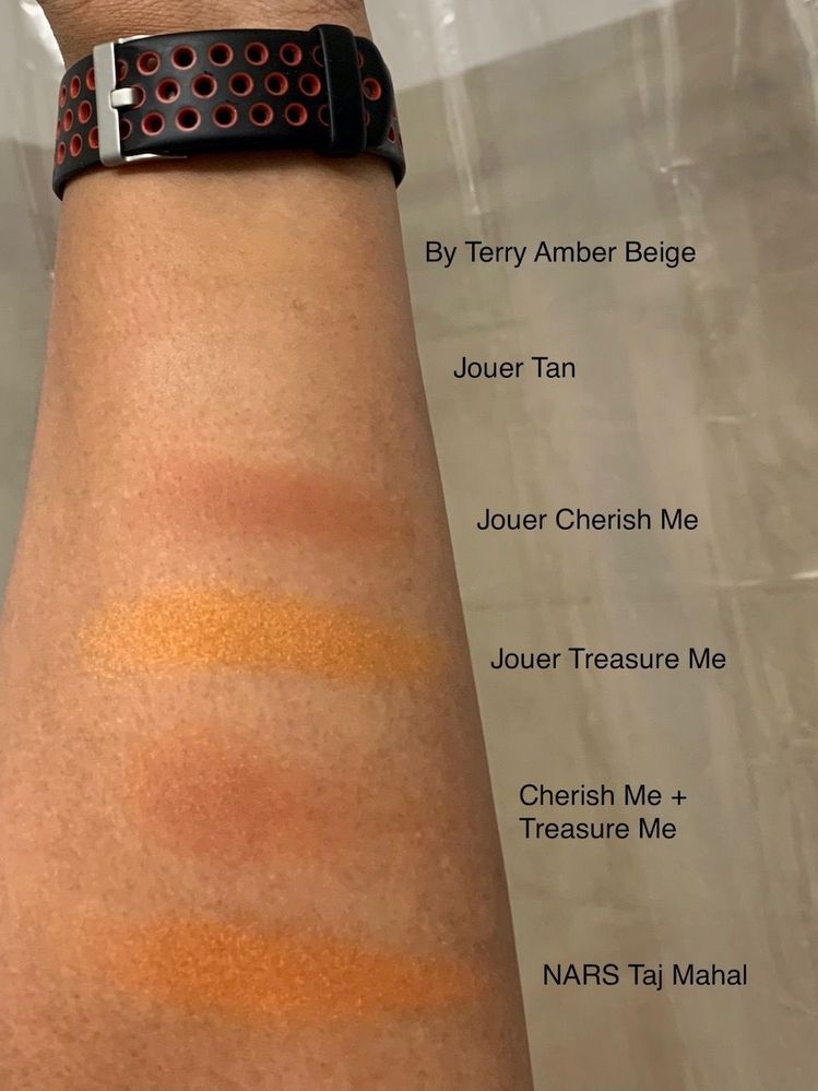 This photo does a bad job of showing off the Jouer blush duo layered as a single swatch. Also, the By Terry powder foundation is such a good match for me, you can barely see it on my arm. :D