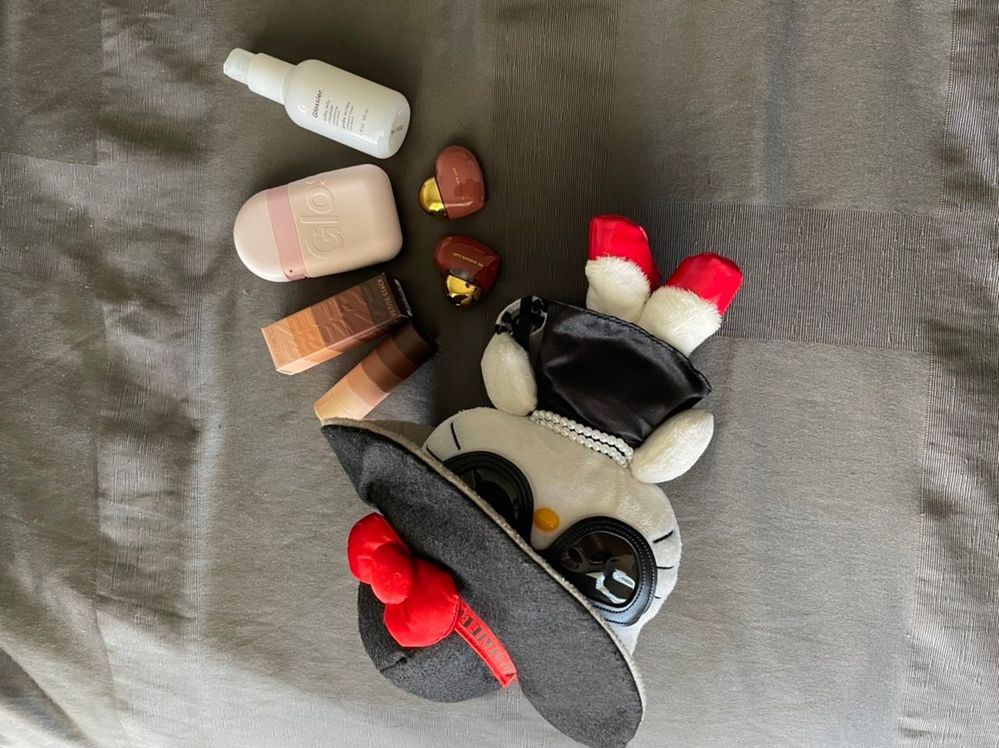 The Hello Kitty is about 11 inches so you can see how small the Melt Petite stack and PMG glosses are