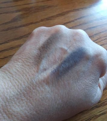 Ash, Yet- these are incorrectly labeled on the Hourglass site.  Ash was the shade I had the most trouble applying; it's not very smooth.  Yet, a navy, is beautiful and applies very well.