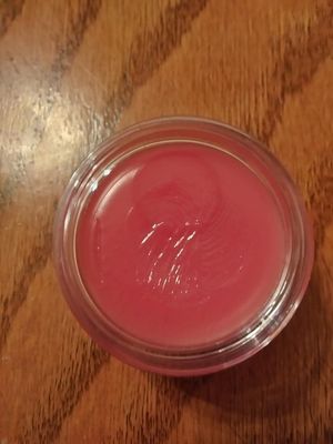 Lip balm- it's clear when applied.  Has a minty, sugary scent- almost like strawberries