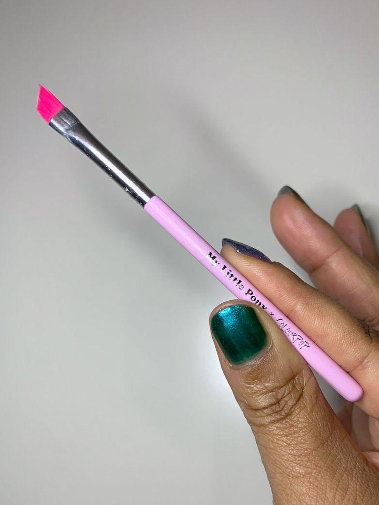 Travel size angled eyeliner brush, from a ColourPop brush set. It's small but mighty.