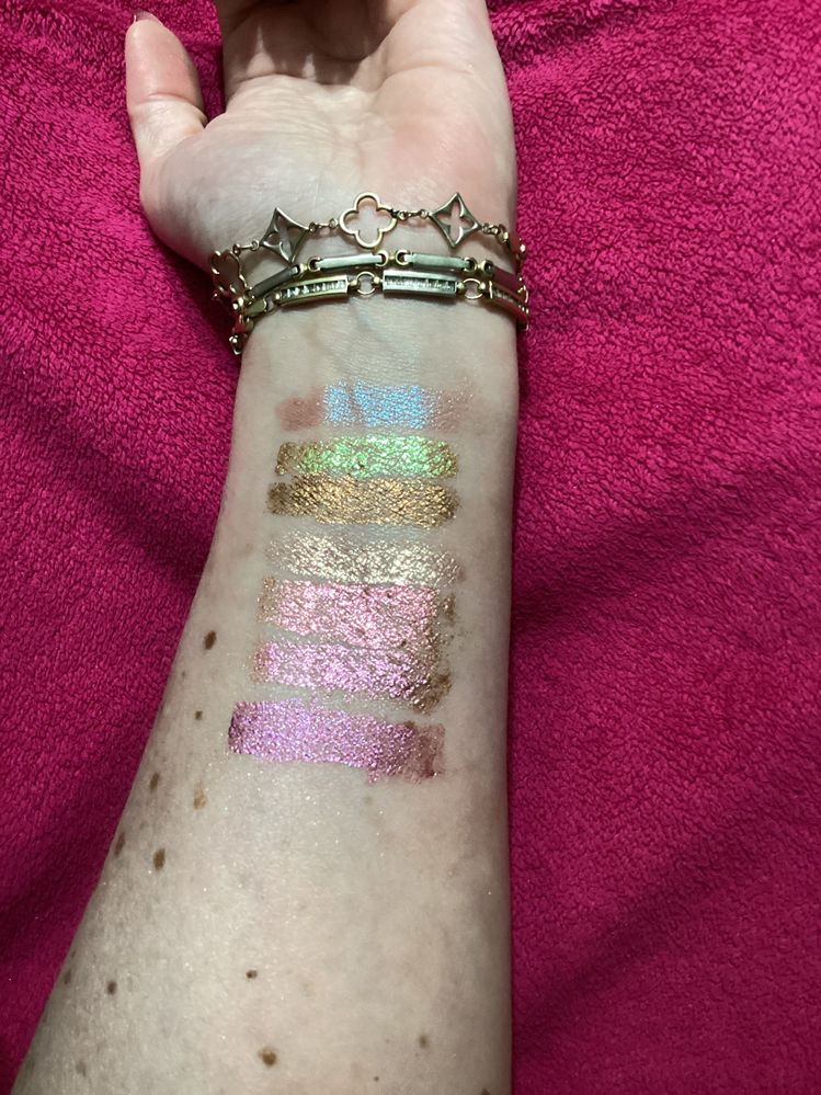 Swatches of the DM COLORFIX ( foils ) + LM Caviar Stick in Rush ( top ). From top to bottom : Jewelz, Nightcap, Fantasy, Alien, Venus and Blossom