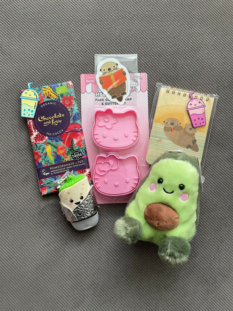 How cute are the Hello Kitty, Avocado plushie, sea otters and burrito sanitizer?