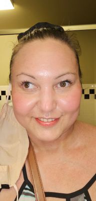 Light hand-top of cheek bone towards temple