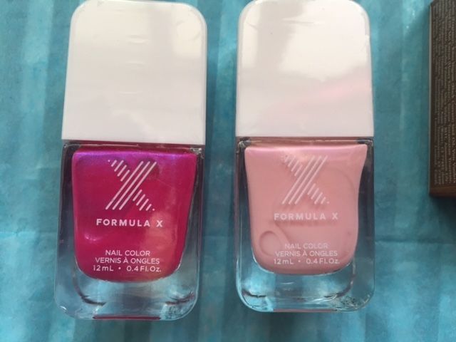 These two colours are really pretty and there are still some left on sale - they both have a duochrome effect that is subtle but really pretty when on the nail - it's "knockout" which is a bright magenta with microfine blue glitter that really makes it pop and "Ladylove" which is a beautiful baby pink with microfine light lavender glitter.  I had already ordered a couple and decided to get some extra to use as gifts! : )