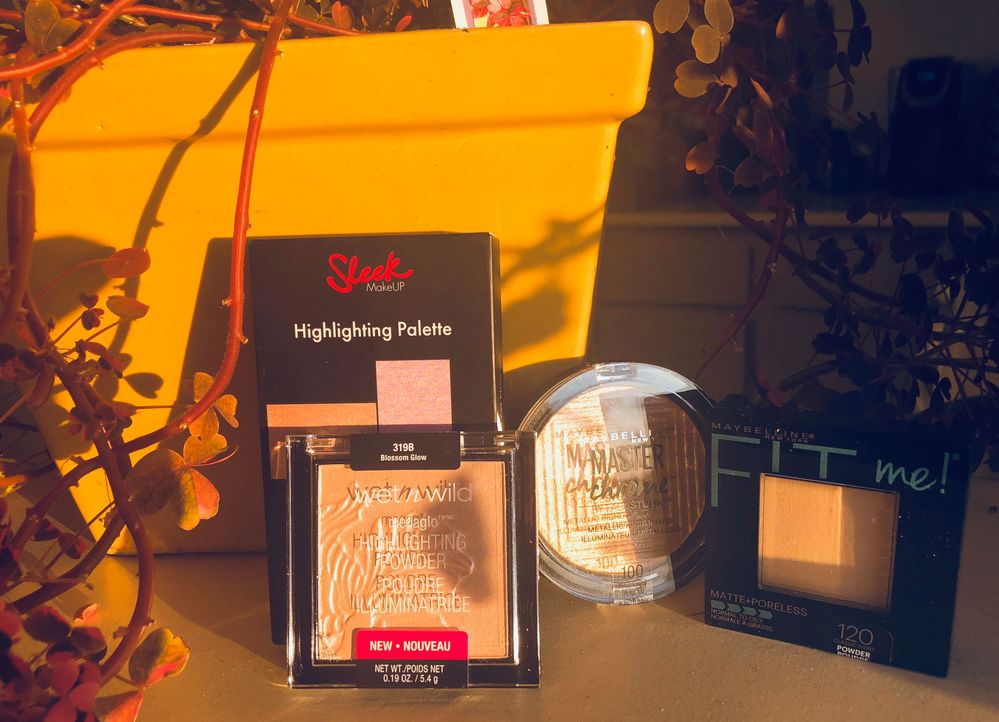 Sleek Makeup Solstice highlighting palette, Wet n Wild highlight in Blossom Glow, Maybelline Master Glow highlight, Maybelline Fit Me powder