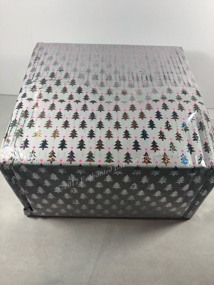 The entire box was wrapped beautifully and the wrapping stayed in tact during the long journey to me!!! <3