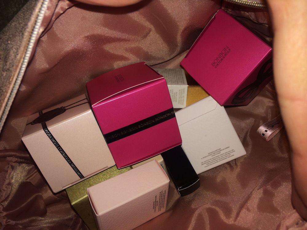 flower bomb, black opium, bon bon, and coach fragrances