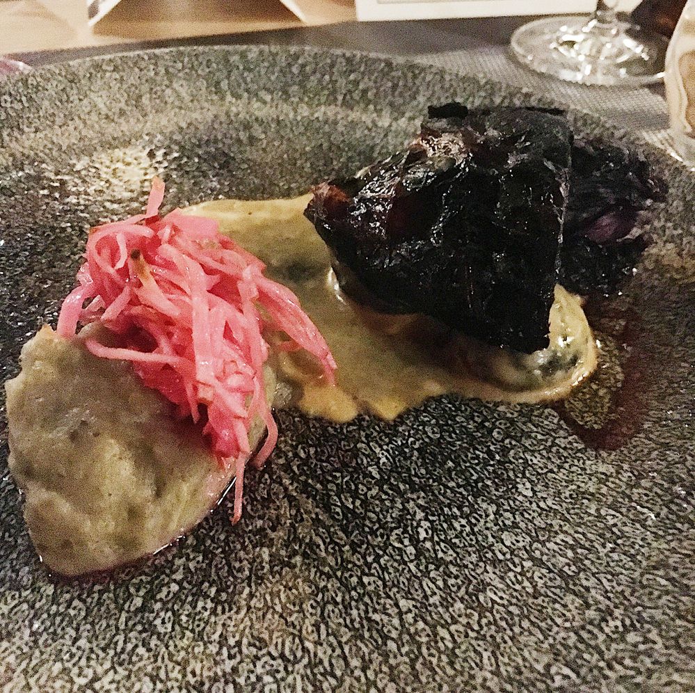 Charred cabbage with polar shiitake mushroom.